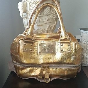 Guia's purse handbag